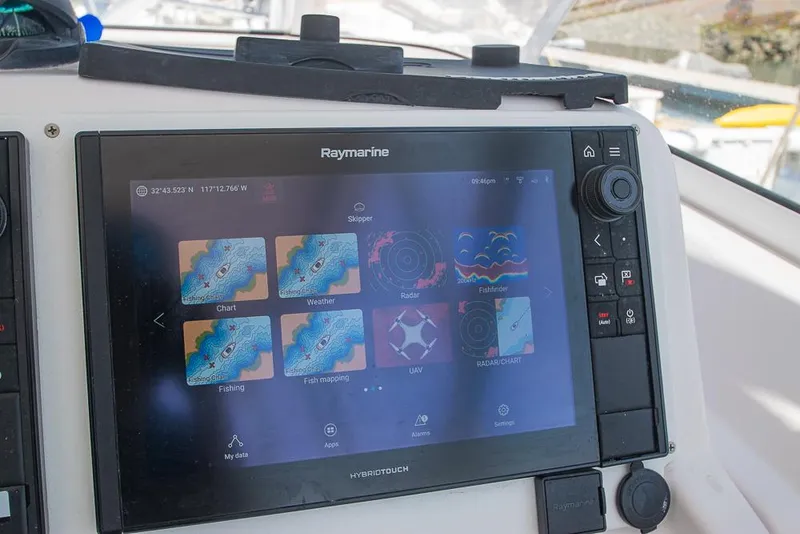 Slide: The Image of Raymarine navigation display on 2009 Pro-Line 35 Express boat dashboard. - 25