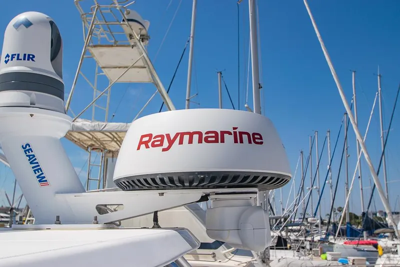 Slide: The Image of Radar equipment on a 2009 Pro-Line 35 Express boat in a marina. - 41