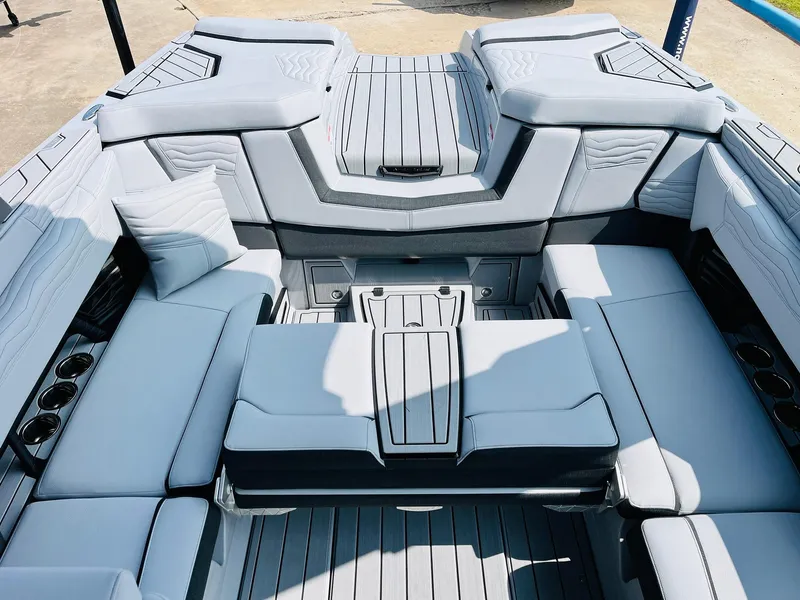 Slide: The Image of 2025 Nautique Super Air G23 boat interior with luxurious seating and modern design. - 35