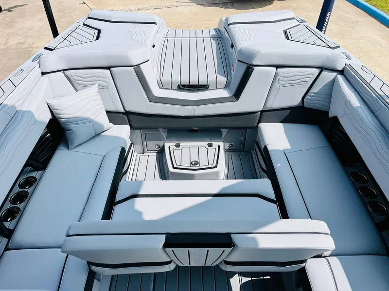 Slide: The Image of 2025 Nautique Super Air G23 boat interior with luxurious seating and modern design. - 36