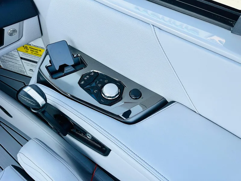 Slide: The Image of 2025 Nautique Super Air G23 control panel with sleek design and modern features. - 49