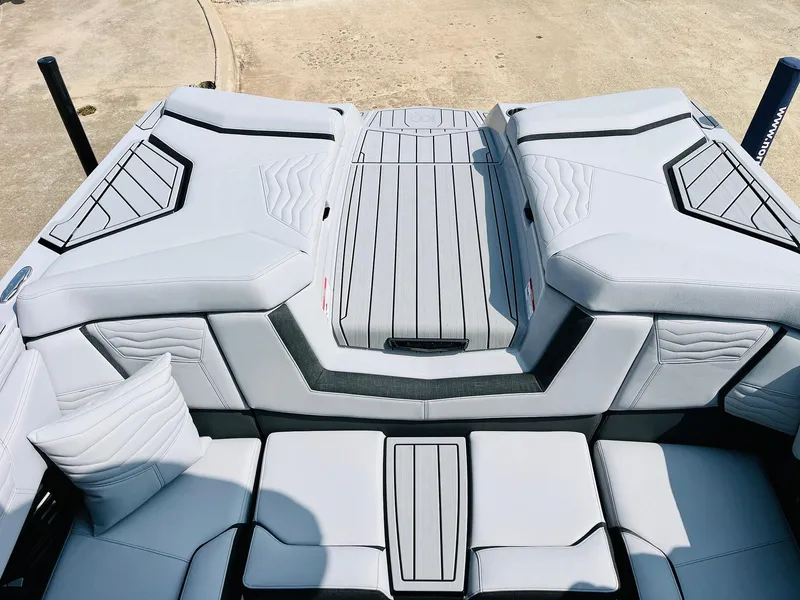 Slide: The Image of 2025 Nautique Super Air G23 boat interior with sleek, modern seating design. - 50