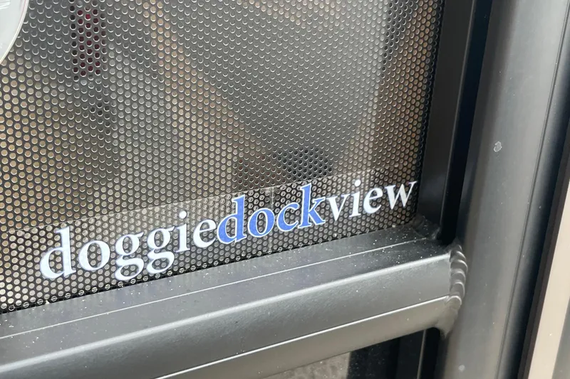 Slide: The Image of Doggie dock view on Barletta L25MAT 2025 model, mesh panel detail. - 11