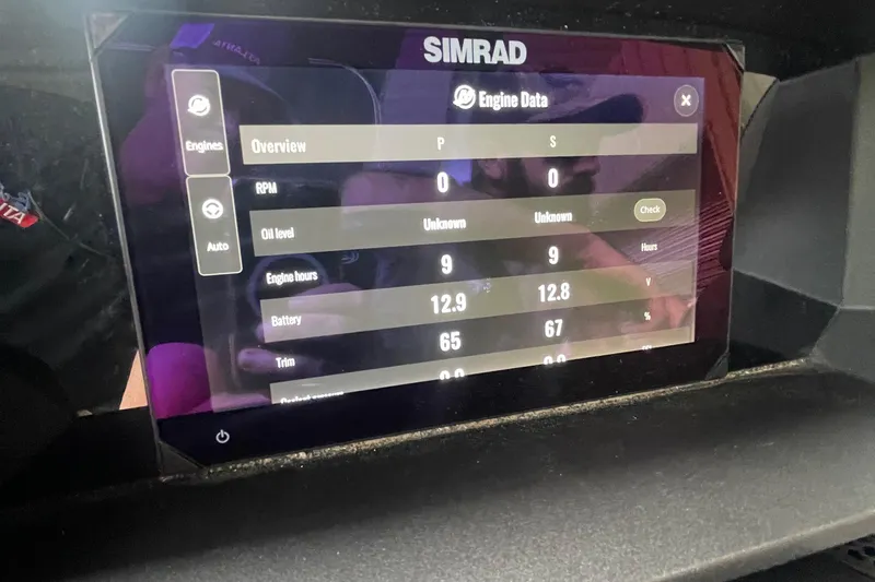 Slide: The Image of Simrad display showing engine data on 2025 Barletta L25MAT boat. - 6