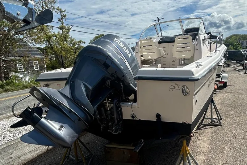 Slide: The Image of 2006 Grady-White Adventure 208 boat with Yamaha outboard motor on a trailer. - 3