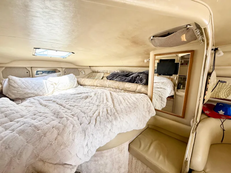 Slide: The Image of Raytheon radar display on 1998 Sea Ray 330 Sundancer boat, showing navigation data. - 15