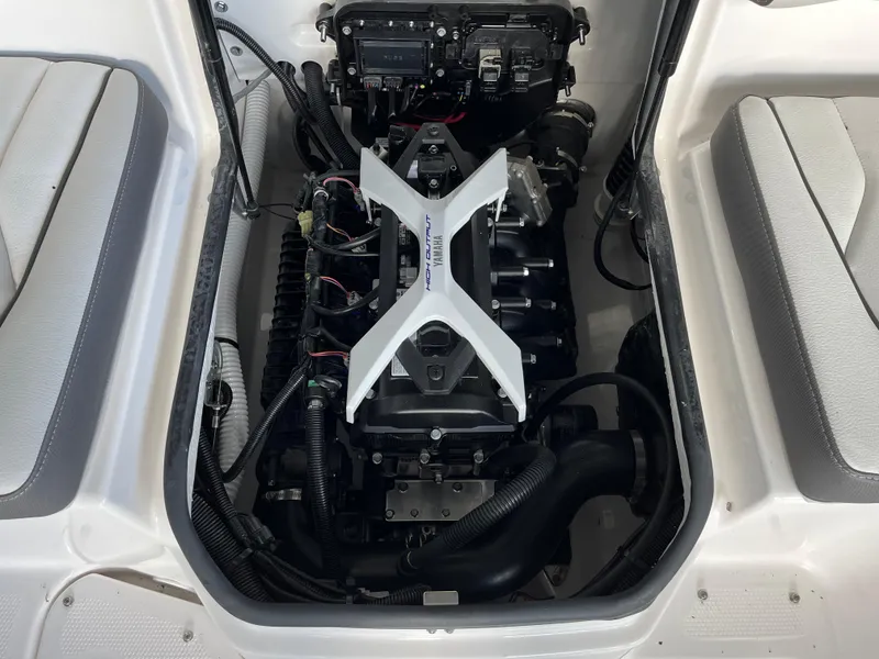 Slide: The Image of 2025 Yamaha AR190 engine compartment with seating, showcasing modern design and engineering. - 6