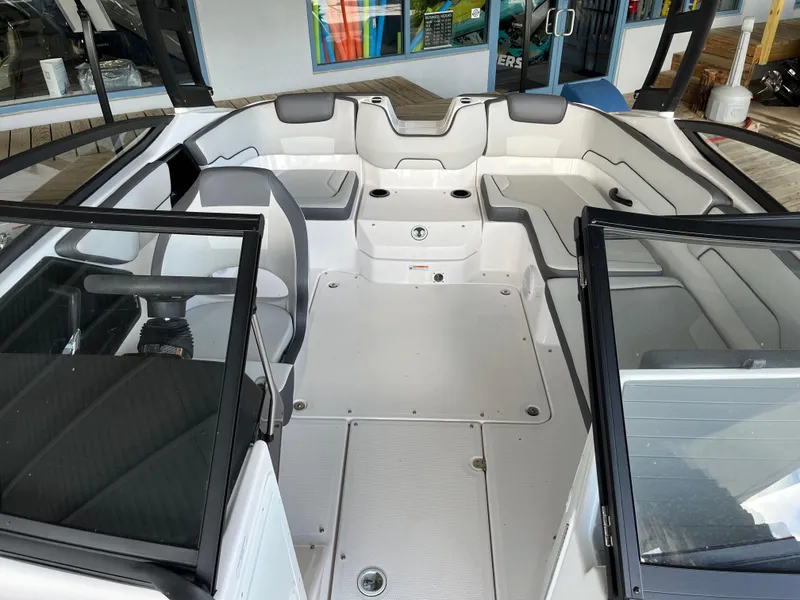 Slide: The Image of 2025 Yamaha Boats AR190 interior with sleek seating and modern design. - 9