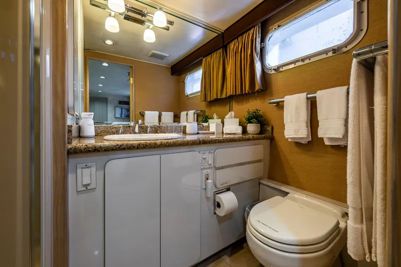 Slide: The Image of Luxurious yacht bathroom with modern fixtures, Broward 102, 1991 model. - 34