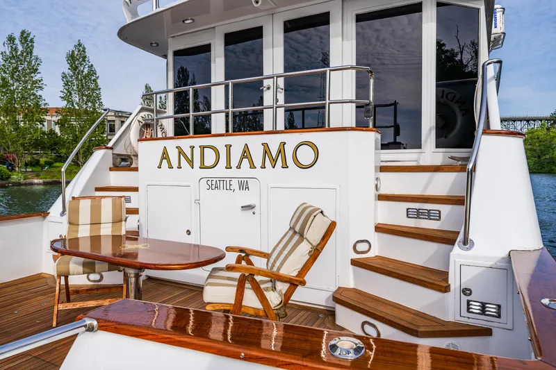Slide: The Image of Luxury yacht deck with seating, Broward 102, 1991 model, named "Andiamo," Seattle, WA. - 8