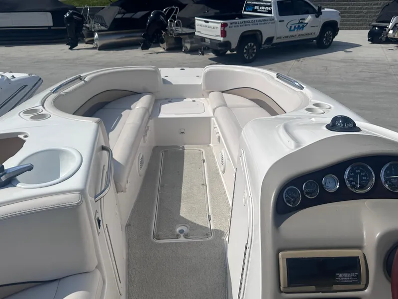 Slide: The Image of 1999 Chaparral 210 Sunesta boat interior with seating and dashboard. - 14