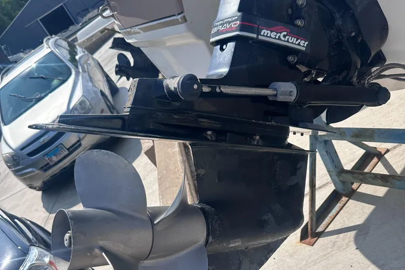 Slide: The Image of 1999 Chaparral 210 Sunesta boat with MerCruiser Bravo outdrive and propeller. - 26