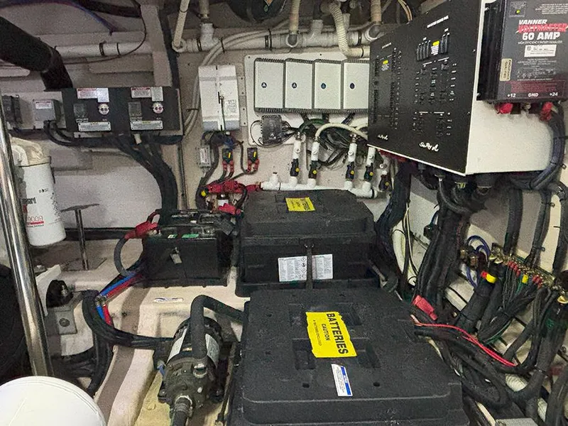 Slide: The Image of Engine room of 2017 Sea Ray L590 yacht with batteries and electrical panels. - 18