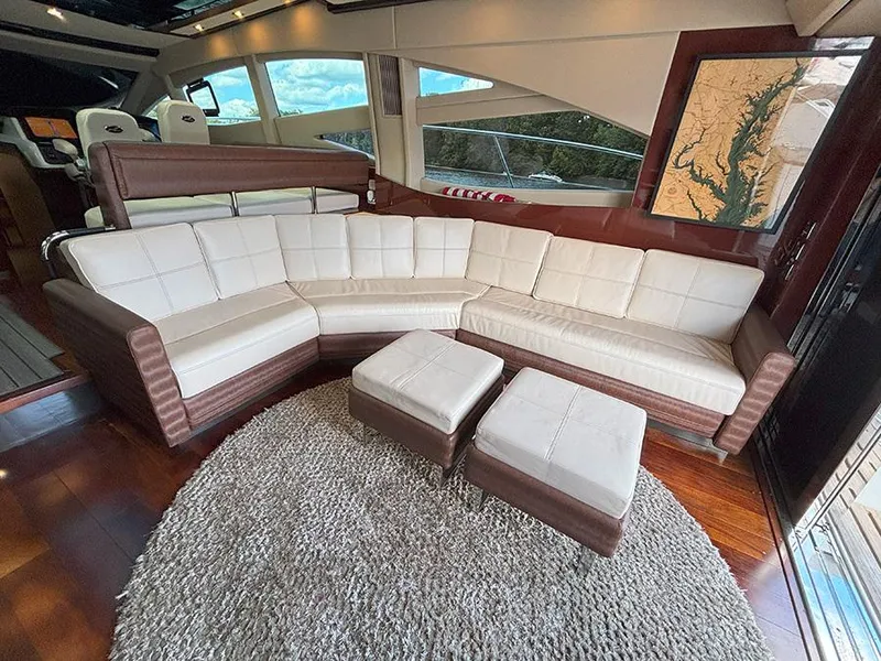 Slide: The Image of Luxurious interior of 2017 Sea Ray L590 yacht with plush seating and elegant decor. - 30
