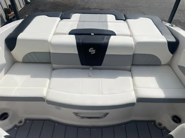 Slide: The Image of 2022 Chaparral 21 Surf boat interior with modern seating and steering wheel. - 5