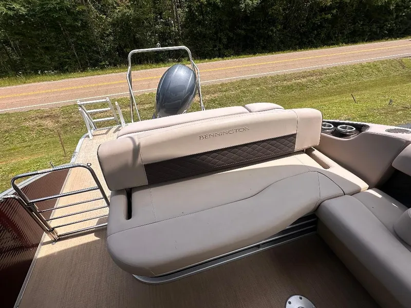 Slide: The Image of 2018 Bennington 23SSBXP boat with Yamaha F150 engine, featuring comfortable seating and sleek design. - 8