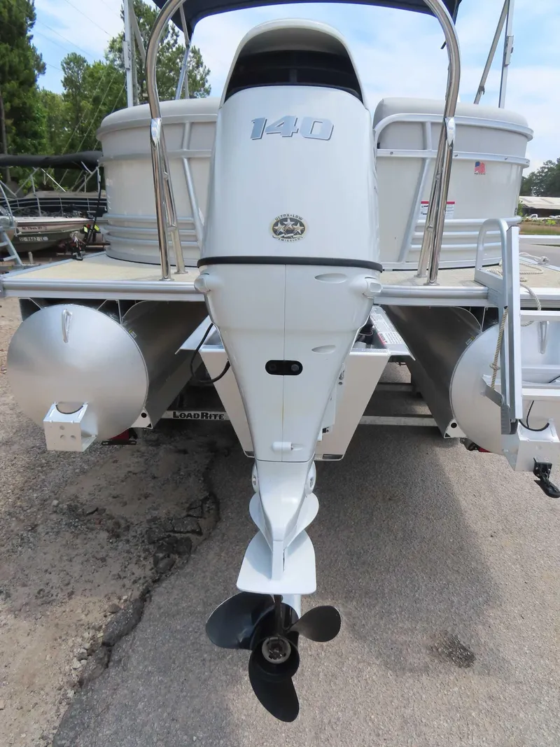 Slide: The Image of 2022 Nepallo pontoon boat with 140 horsepower outboard motor, rear view. - 11