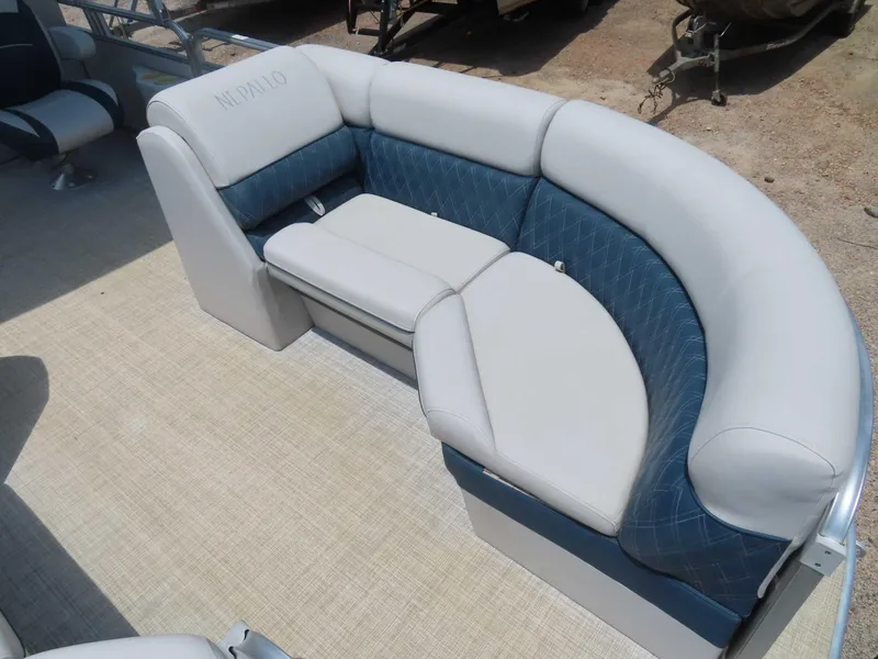 Slide: The Image of 2022 Nepallo pontoon boat seating with blue and white upholstery. - 14