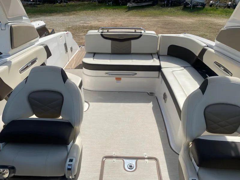 Slide: The Image of 2018 Chaparral 267 SSX boat interior with luxurious seating and modern design. - 12