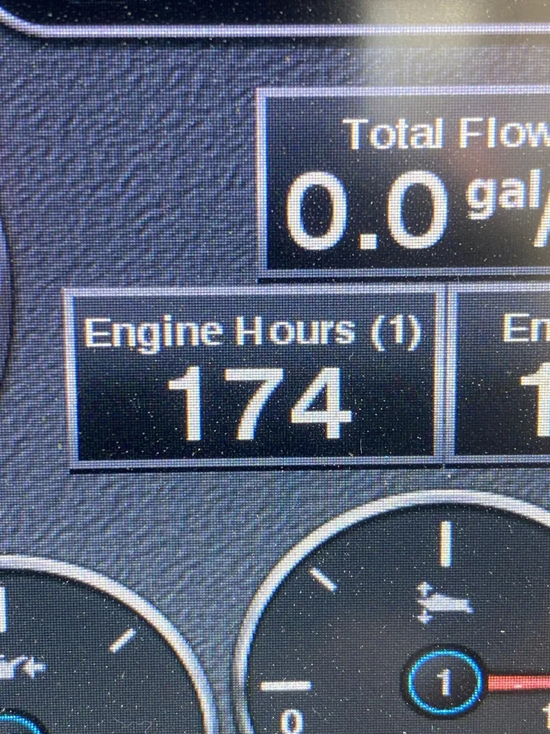 Slide: The Image of Close-up of Chaparral 267 SSX 2018 dashboard showing 174 engine hours. - 17