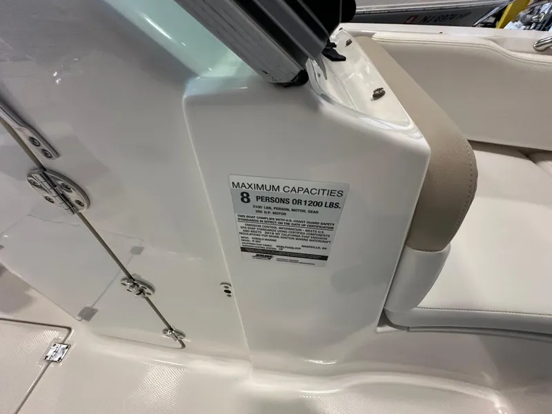 Slide: The Image of 2019 Robalo R207 Dual Console boat capacity label, seating for 8 people or 1200 lbs. - 20