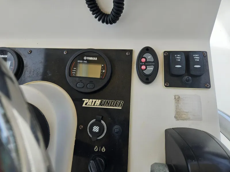 Slide: The Image of Control panel of 2011 Pathfinder 2400 Tournament Edition boat with Yamaha speed gauge. - 19