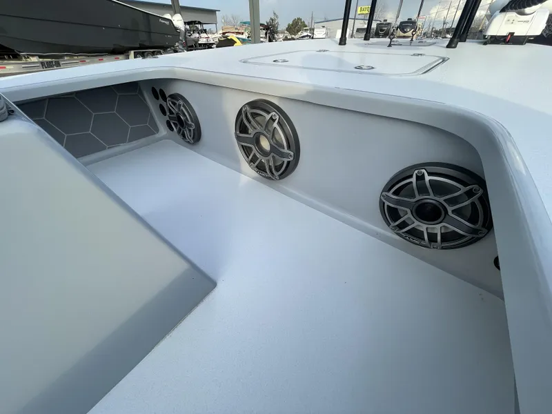 Slide: The Image of Interior of 2023 ZCB 18 Curlew boat with built-in speakers and modern design. - 13