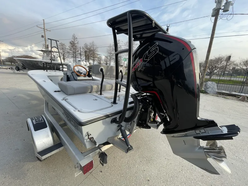 Slide: The Image of 2023 ZCB 18 Curlew boat with Mercury 115 Pro XS engine on trailer. - 4