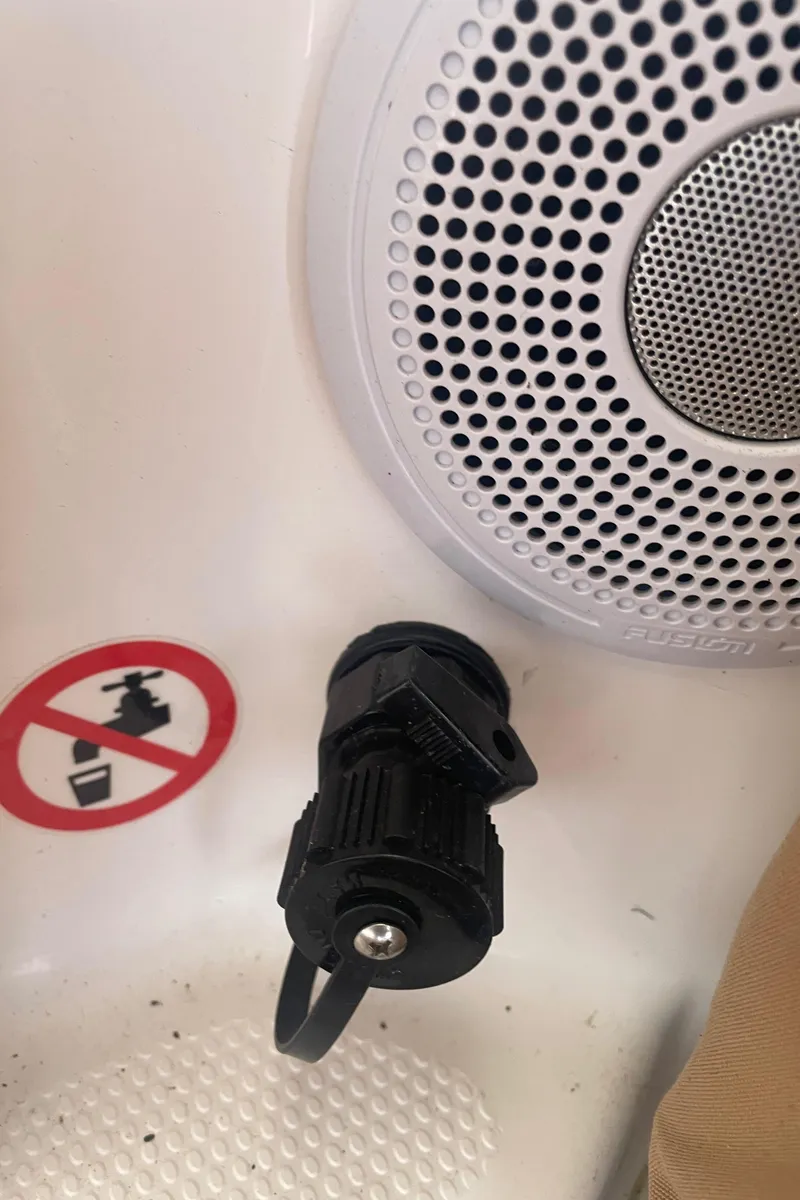 Slide: The Image of Speaker and socket on 2023 Ranger Tugs R-25 boat interior. - 12