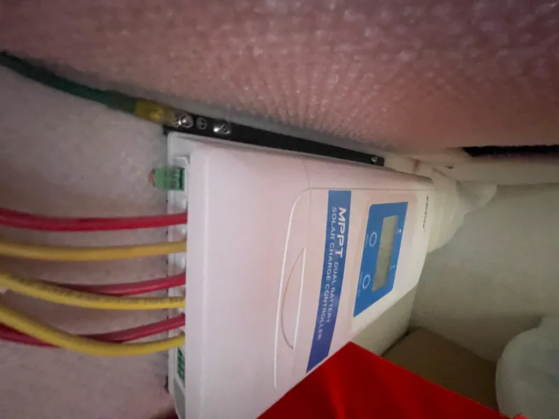 Slide: The Image of MPPT solar charge controller in 2023 Ranger Tugs R-25 boat. - 35