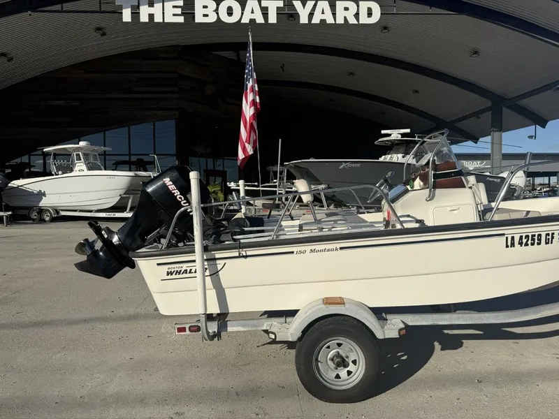 Slide: The Image of 2007 Boston Whaler 150 Montauk boat on trailer at The Boat Yard. - 3