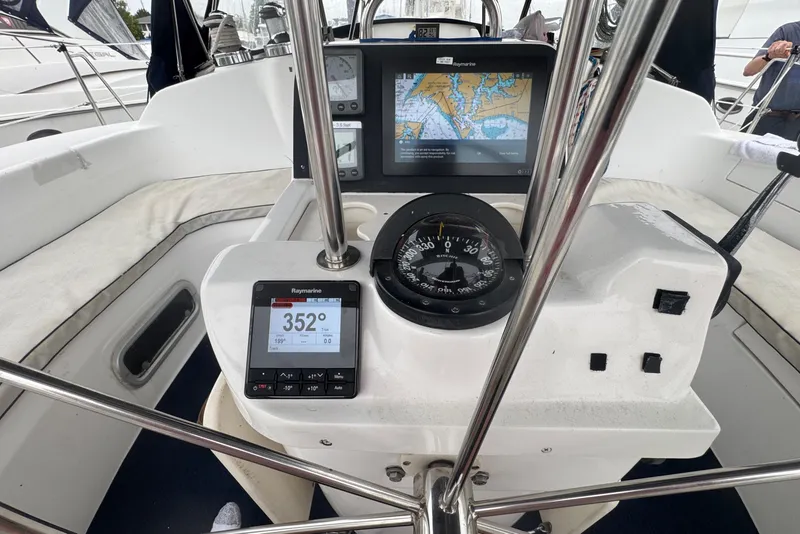 Slide: The Image of Cockpit of 1998 Hunter 410 sailboat with navigation instruments and compass. - 22