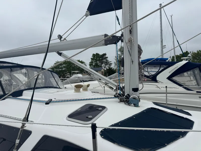 Slide: The Image of Hunter 410 sailboat from 1998, docked with visible rigging and deck details. - 30