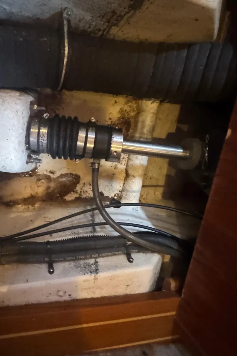 Slide: The Image of Boat engine compartment with shaft and hoses, Hunter 410, 1998 model. - 9