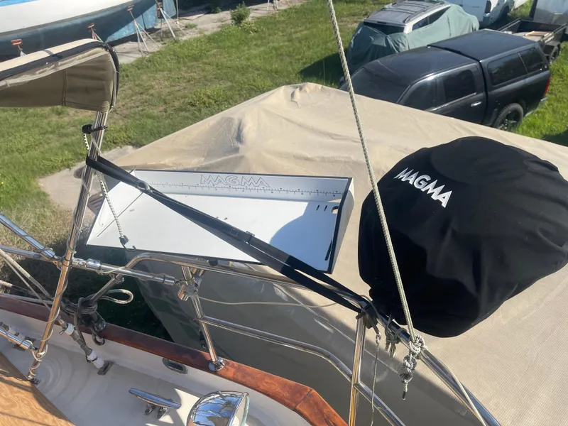 Slide: The Image of 1976 Cheoy Lee Clipper 42 sailboat deck with Magma grill cover. - 15