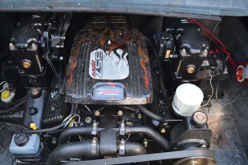 Slide: The Image of Engine of a 1997 Maxum 2300 SR boat with custom flame design. - 17