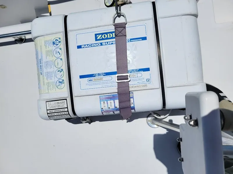 Slide: The Image of Zodiac Racing Super container on 1999 Mainship 430 Trawler deck. - 29