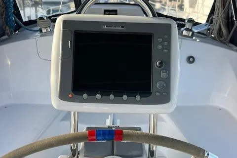 Slide: The Image of Steering console of 2006 Hunter 44 Deck Salon sailboat with navigation display. - 9