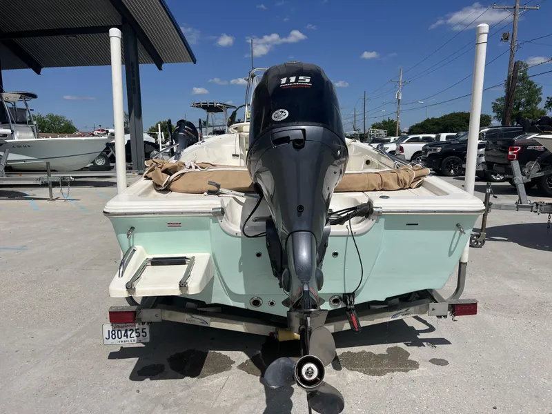Slide: The Image of 2018 Key West 176 Island Bay boat with outboard motor on trailer. - 3