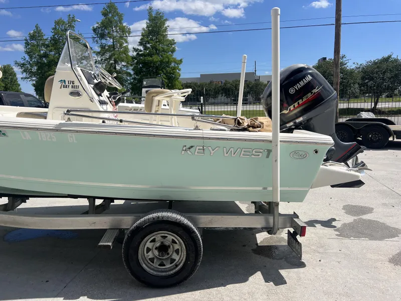 Slide: The Image of 2018 Key West 176 Island Bay boat on trailer with Yamaha outboard motor. - 5