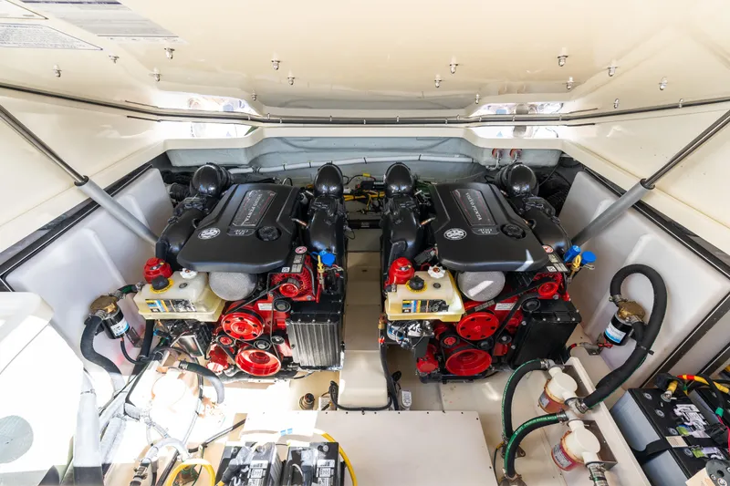 Slide: The Image of Engine compartment of 2025 Chris-Craft Launch 35 GT, showcasing dual powerful engines. - 14