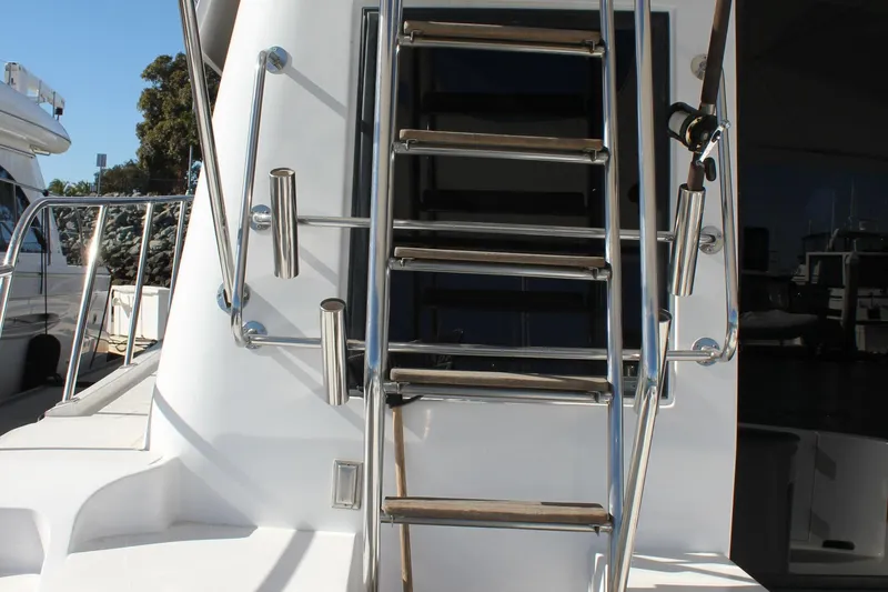 Slide: The Image of Stainless steel ladder on a 1994 Mikelson 64 yacht deck. - 32