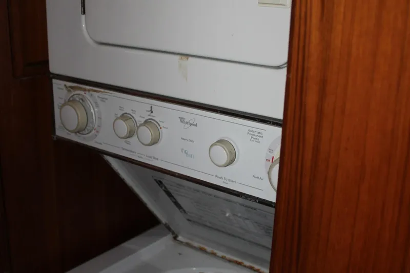 Slide: The Image of Stacked washer and dryer unit in a Mikelson 64, 1994 model. - 35