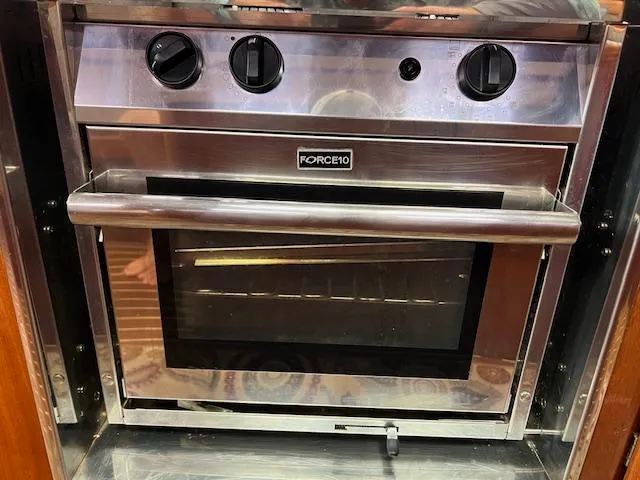 Slide: The Image of Stainless steel Force 10 oven in a 2000 Bavaria 42 Cruiser yacht kitchen. - 30