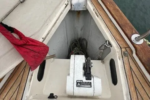 Slide: The Image of Anchor locker of a 2000 Bavaria 42 Cruiser with ropes and winch. - 40
