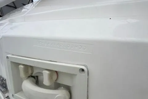 Slide: The Image of Bavaria 42 Cruiser 2000 model, white hull with visible serial number. - 49