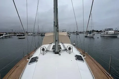 Slide: The Image of Bavaria 42 Cruiser 2000 yacht deck view in a marina with overcast skies. - 8