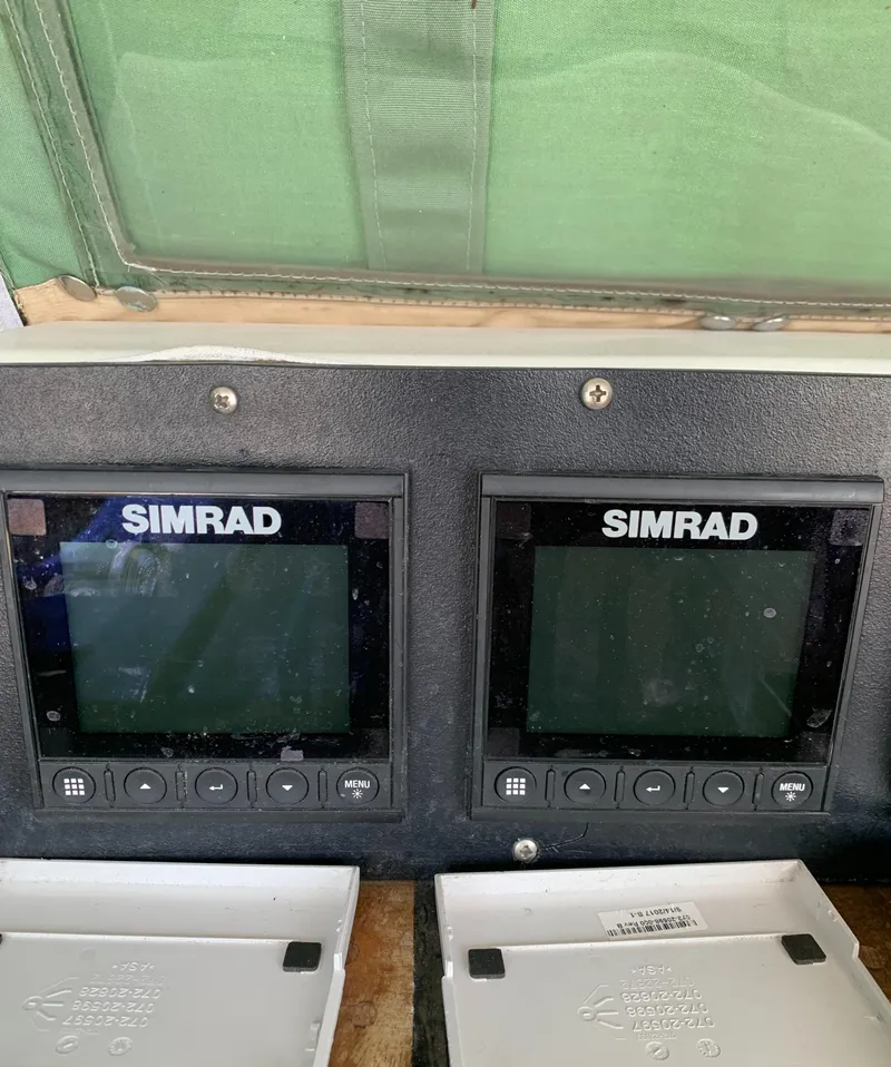Slide: The Image of Simrad navigation displays on a 1979 Robert Perry 41 Sloop sailboat. - 26