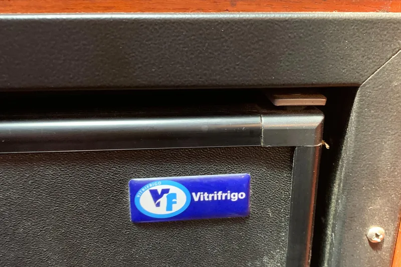 Slide: The Image of Vitrifrigo refrigerator on 1979 Robert Perry 41 Sloop yacht interior. - 42