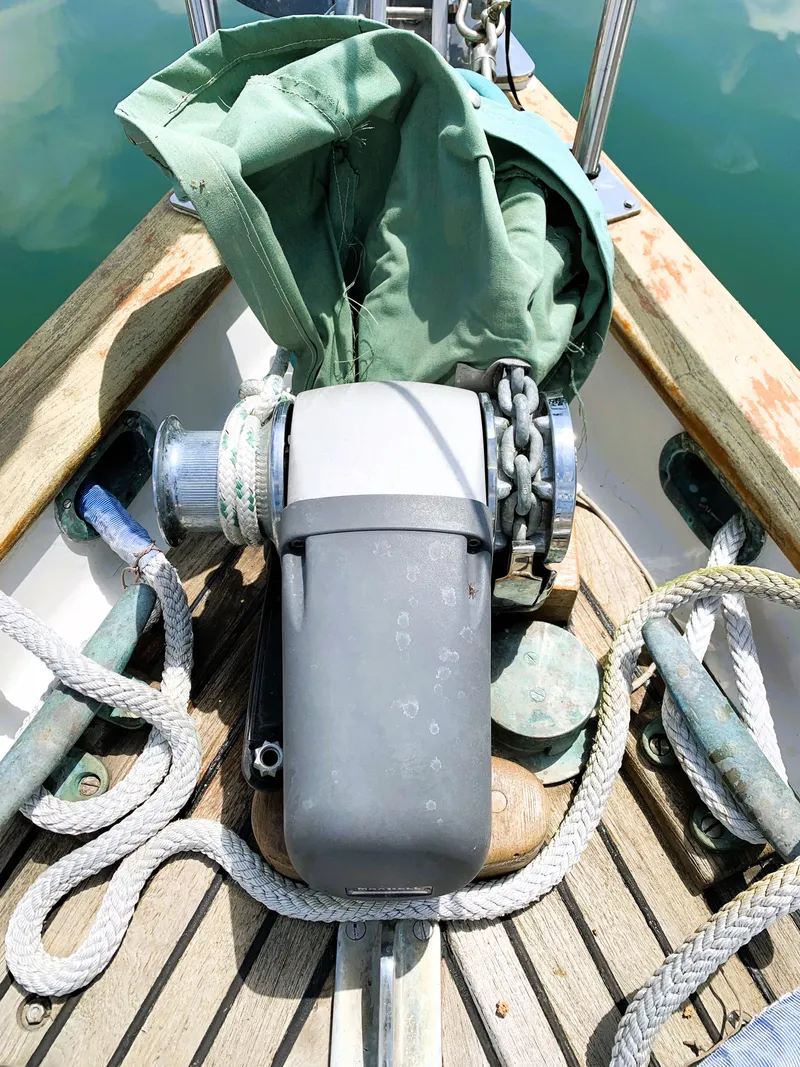 Slide: The Image of Anchor windlass on 1979 Robert Perry 41 Sloop with ropes and chain. - 8